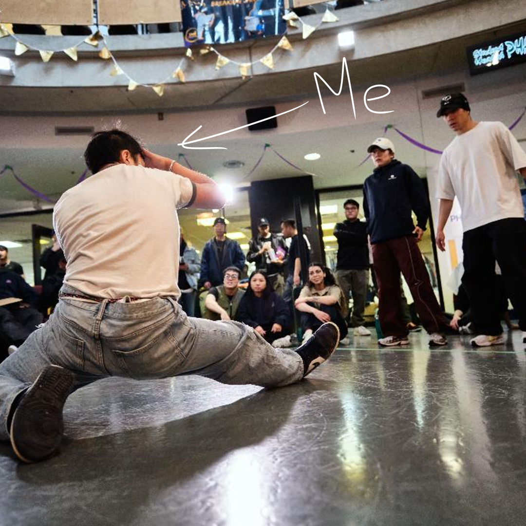 Jaydon at the Ground FX event, pointed out by an arrow labeled 'Me' among the crowd watching a battle