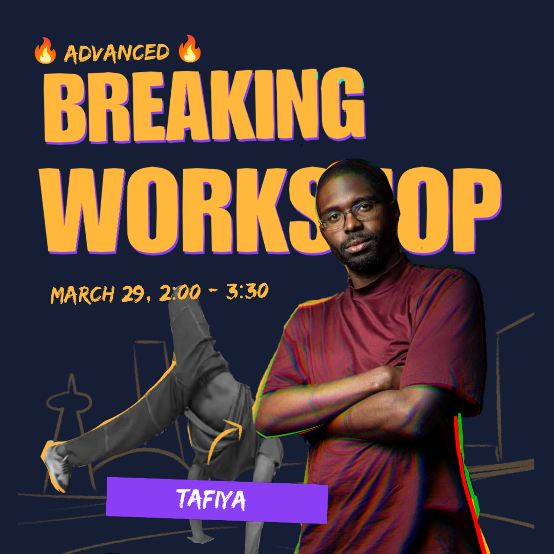 A workshop host teaching a breaking technique